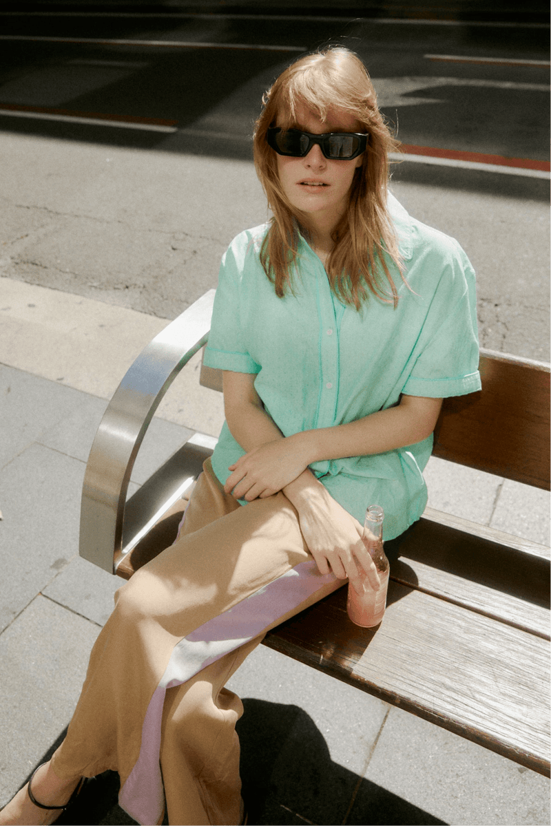 Woman Model in Mocha Pant with Lavender Side Stripe